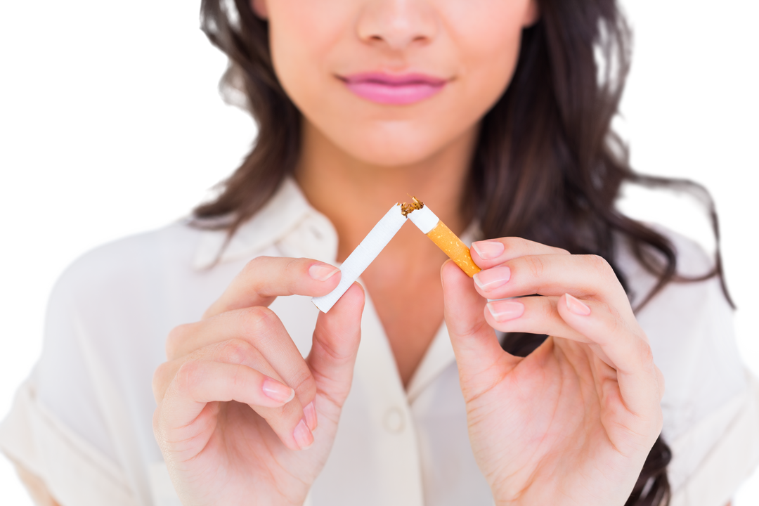 Determined Woman Breaking Cigarette Emphasizing Anti-Smoking Transparent Background - Download Free Stock Images Pikwizard.com