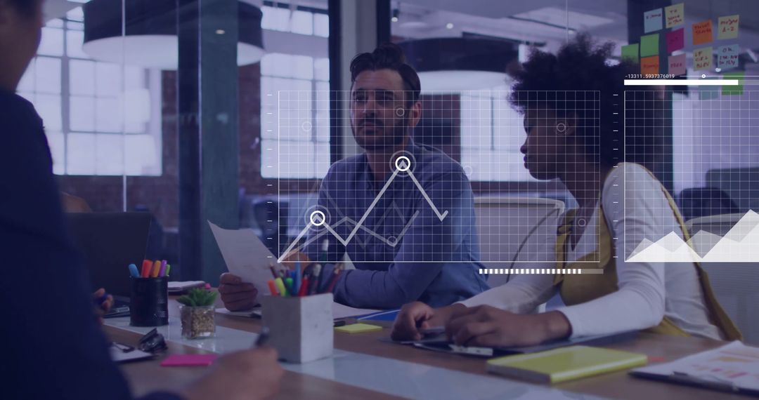 Diverse Business Team Discussing Strategy with Data Overlay