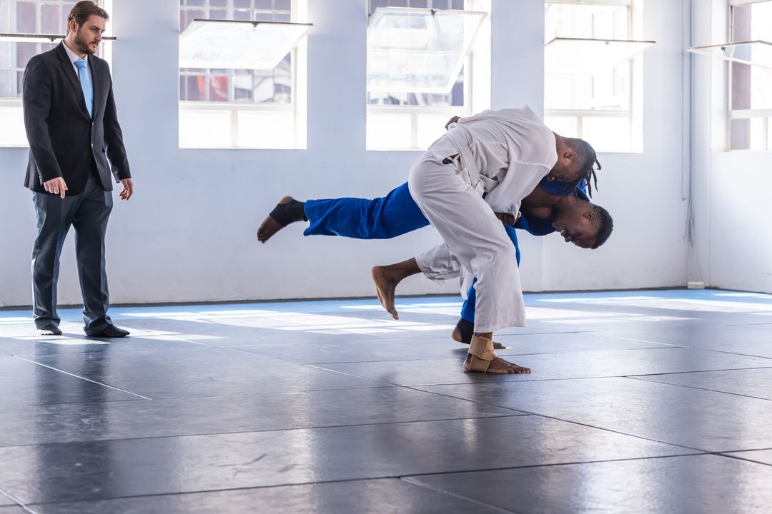 Martial Arts Training with Takedown Technique in Dojo