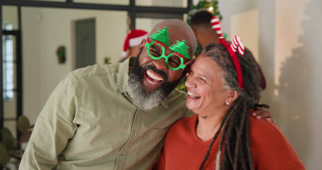 Senior Couple Celebrating Christmas with Joyful Smiles