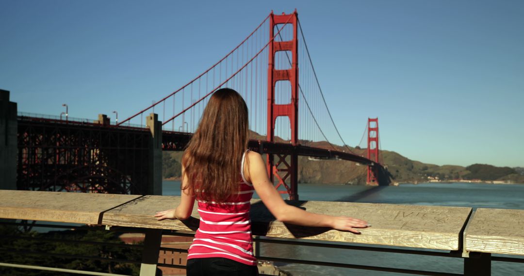 Woman Admiring Golden Gate Bridge in San Francisco - Free Images, Stock Photos and Pictures on Pikwizard.com