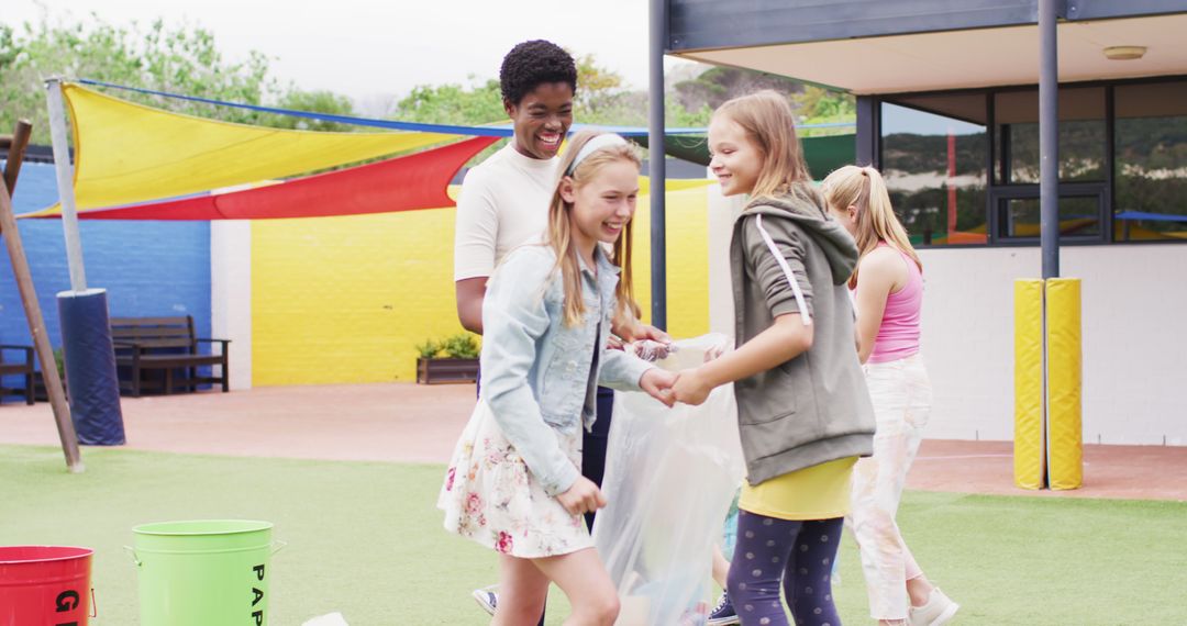 Children and Teacher Engaged in Playground Cleanup Activity