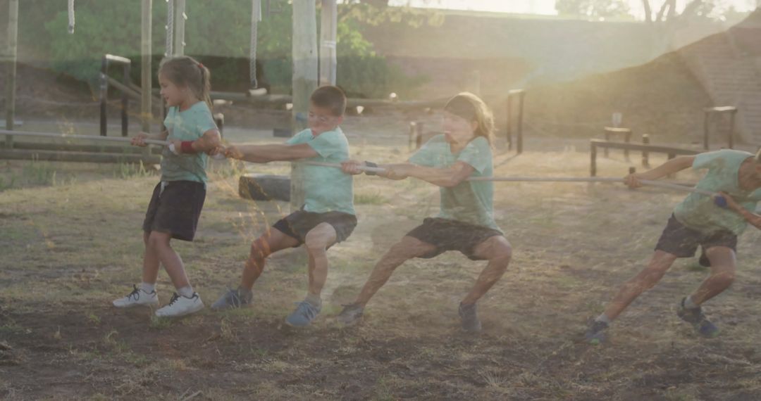 Energetic Kids Engaged in Tug-of-War at Playground