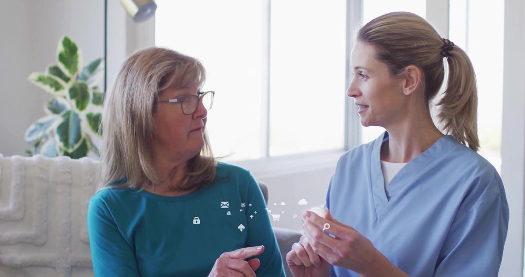 Compassionate Caregiver Assisting Woman with Medication Guidance