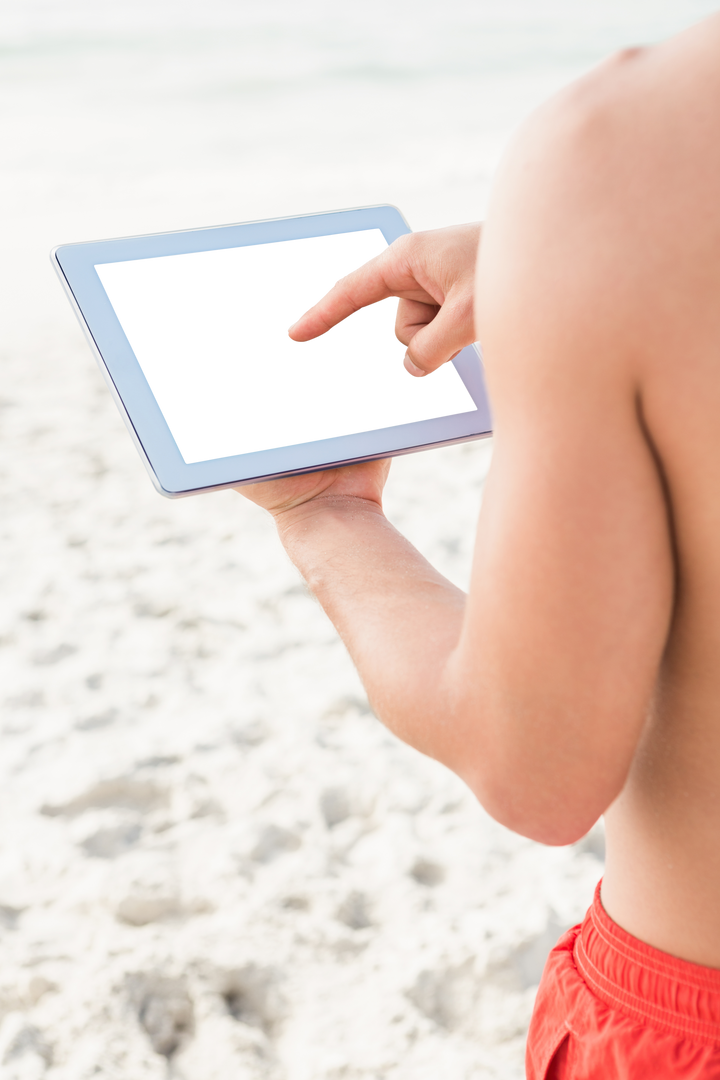 Close-Up of Man Using Digital Tablet with Transparent Screen on Sunny Beach - Download Free Stock Images Pikwizard.com