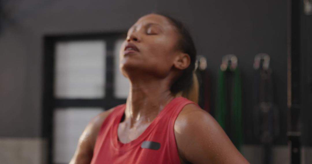Focused Athlete in Gym Reflecting Inner Strength
