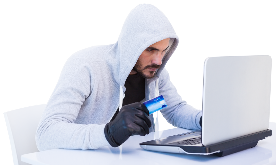 Hacker Wearing Hoodie Using Credit Card on Laptop Transparent - Download Free Stock Images Pikwizard.com