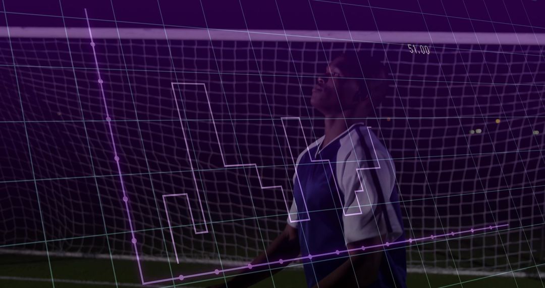 Soccer Player Analyzing Performance Data at Night