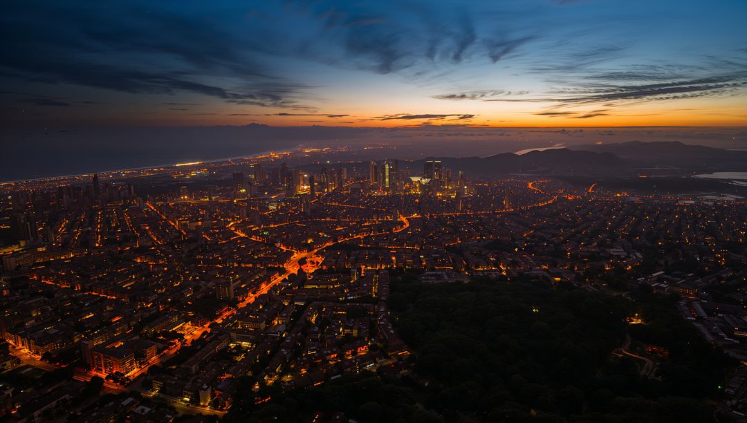 Capturing coastal skyline glowing at dusk from elevated vantage with skyscrapers, harbor lights