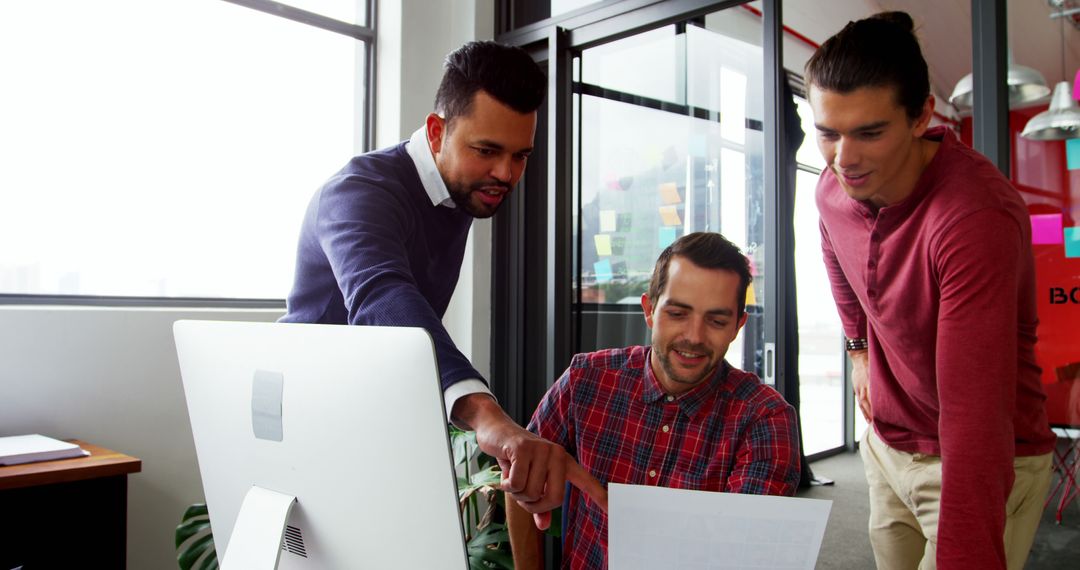 Motivated Team Collaborating on Modern Business Project