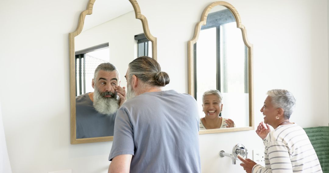 Senior Couple Skincare Routine in Modern Bathroom