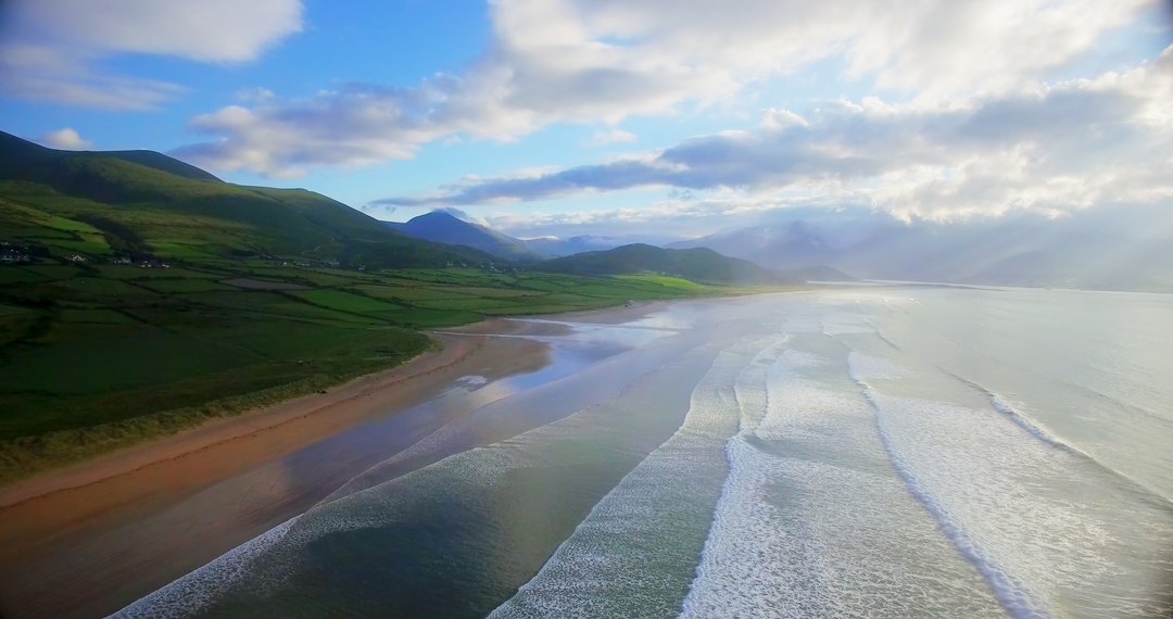 Idyllic Seaside View with Mountains and Clouds on a Bright Day - Download Free Stock Images Pikwizard.com