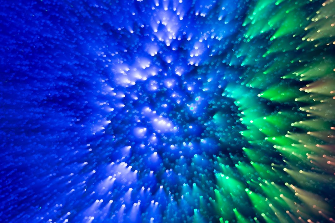 Vibrant Abstract Burst of Blue and Green Lights