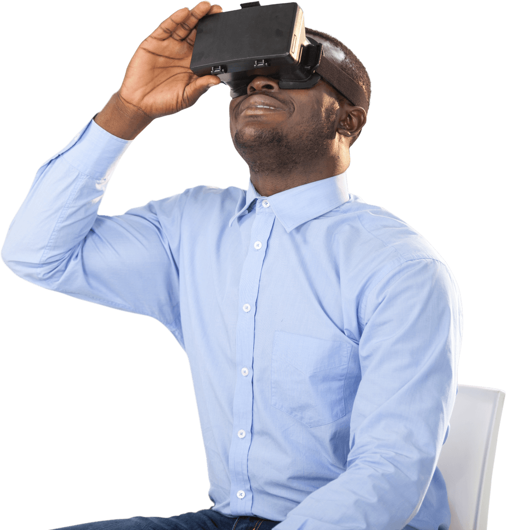 Happy Man Using Virtual Reality Headset in Office Setting with Transparent Background