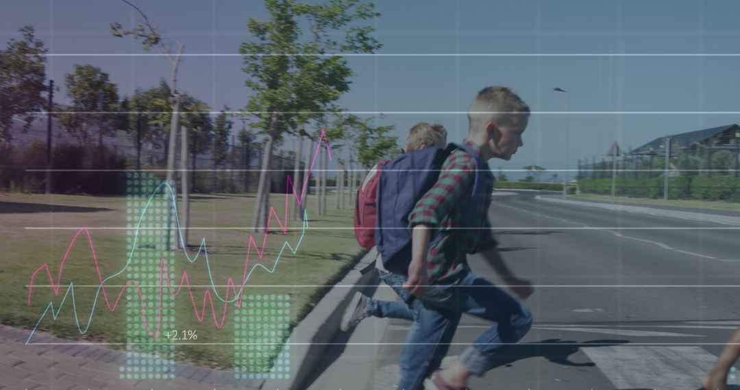 Energetic Boys Running with Backpacks Across Urban Street