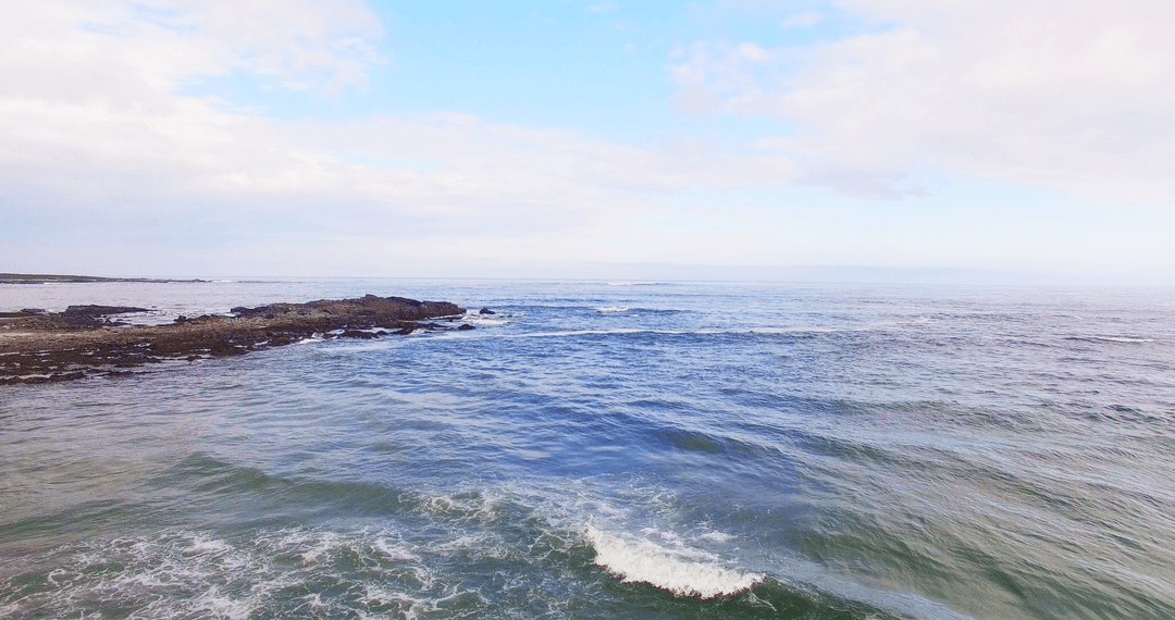 Transparent Blue Sky Over Tranquil Ocean Landscape