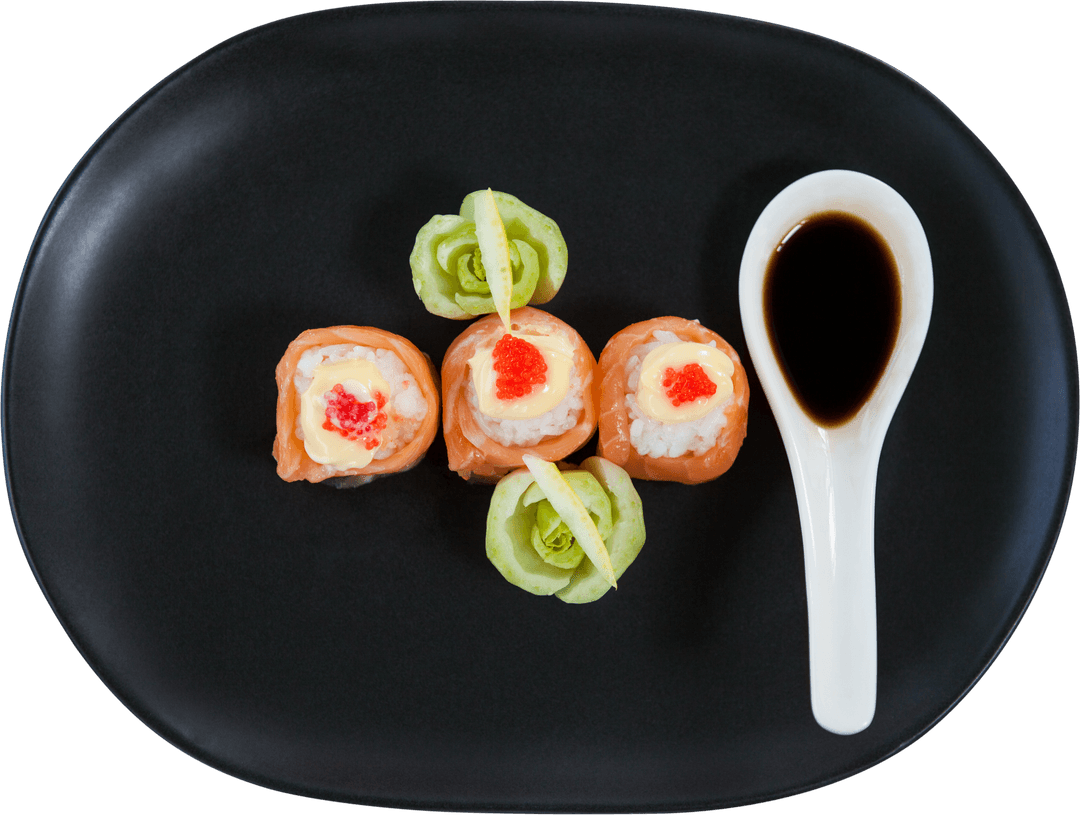 Transparent Plate Serving Delicious Sushi and Dipping Sauce