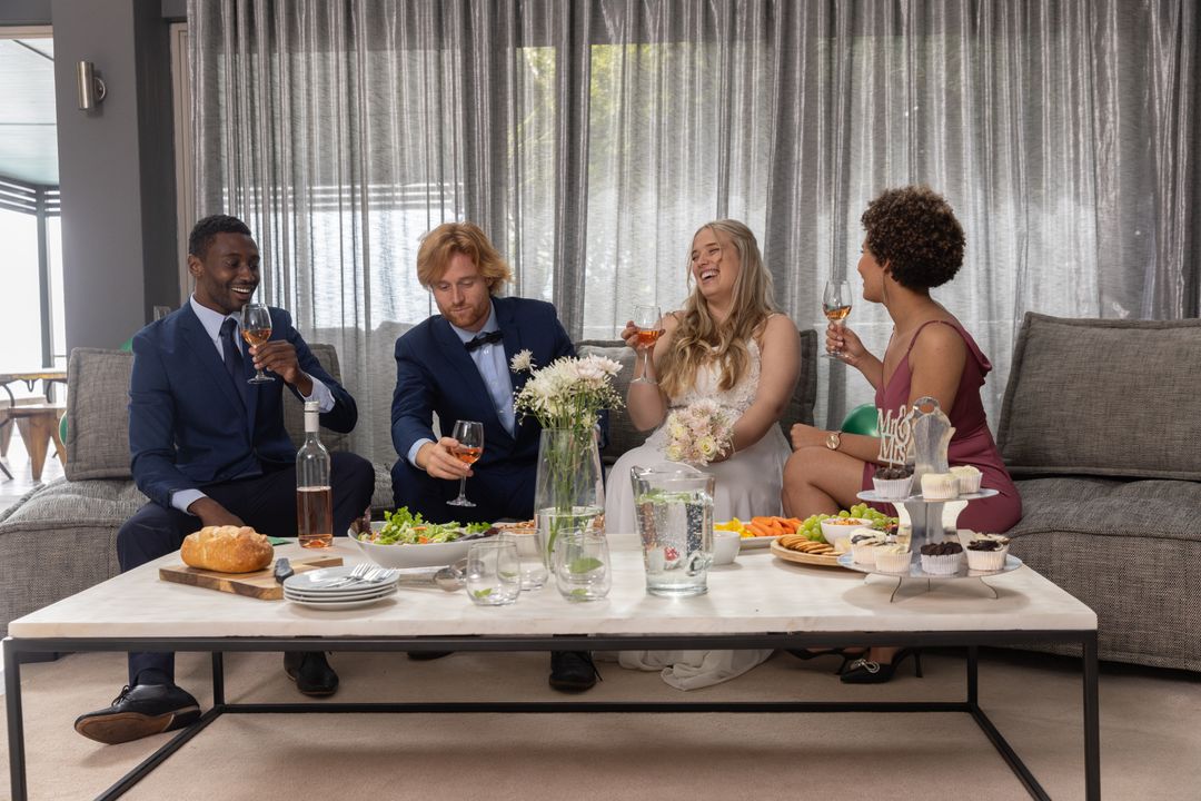 Wedding Party Enjoying Appetizers with Wine in Elegant Lounge