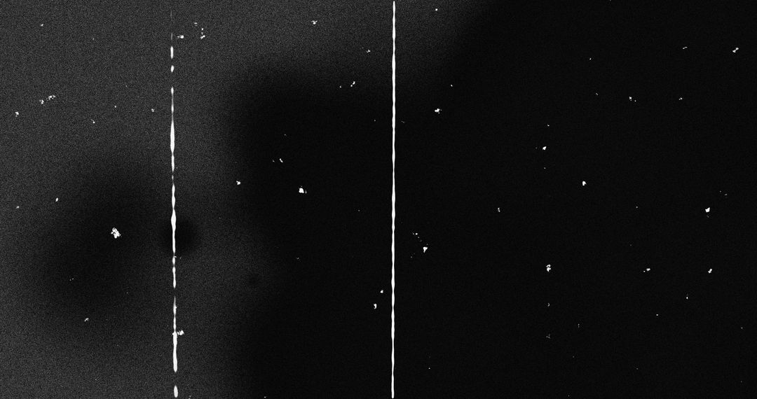 Abstract White Specks with Vertical Glitch on Black Background