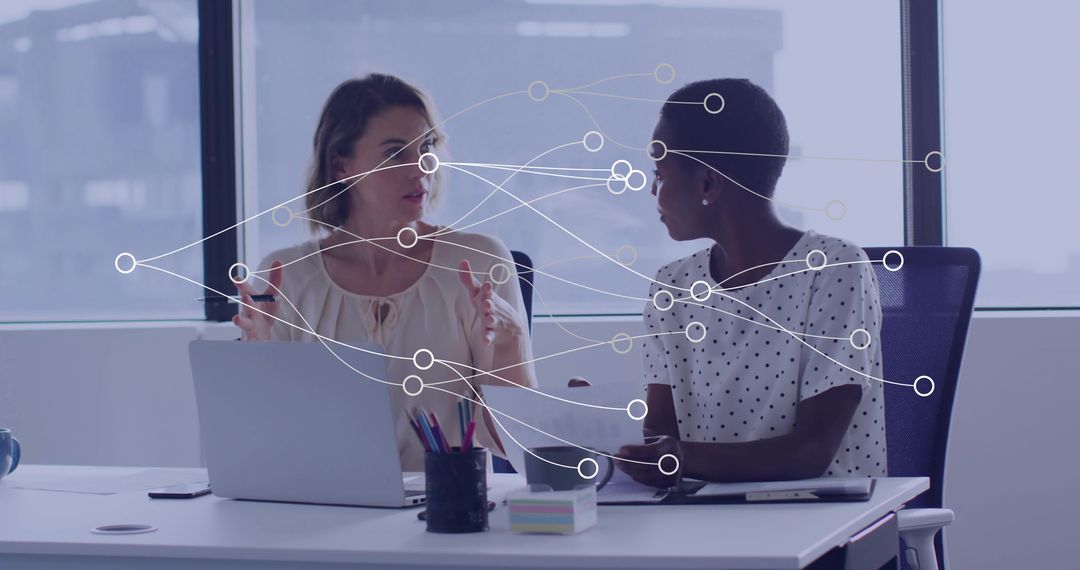 Diverse Businesswomen Collaborating with Digital Network Interface