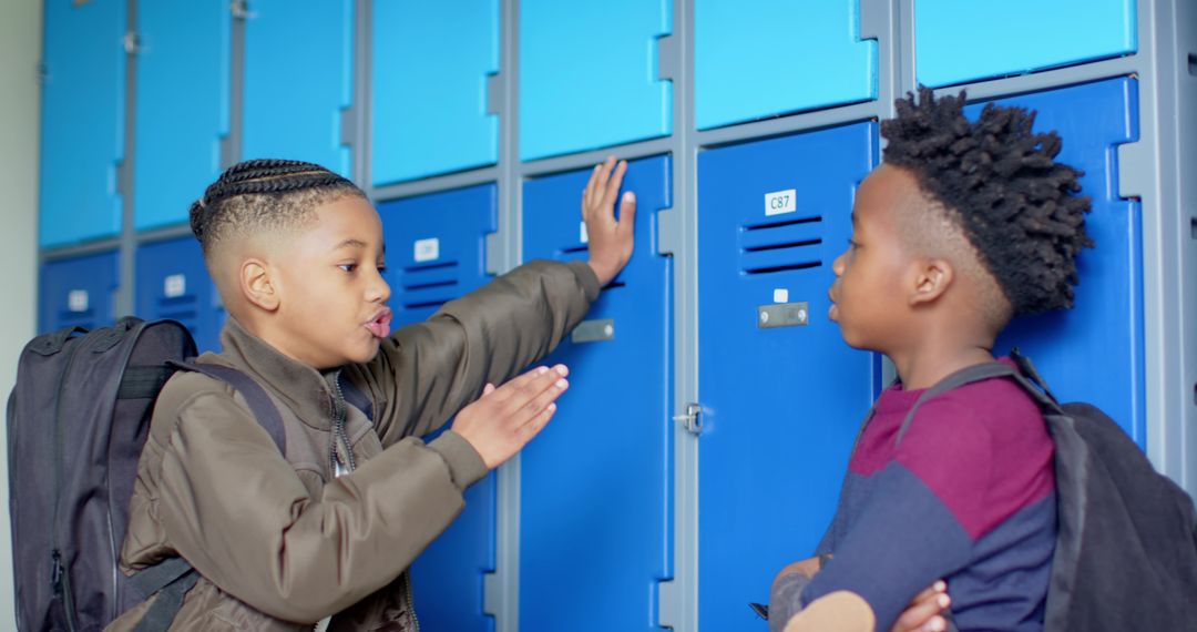 Two Schoolboys Engaging in Conversation by the Lockers