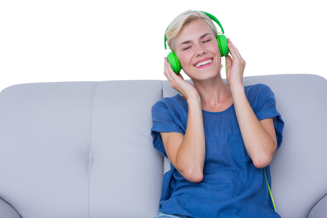 Happy Woman Enjoying Music on Couch with Green Headphones, Transparent Background - Download Free Stock Images Pikwizard.com