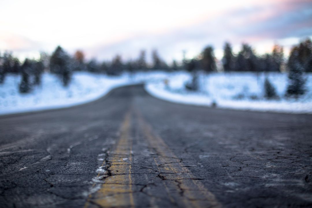 Empty Winding Road in Wintery Landscape - Free Images, Stock Photos and Pictures on Pikwizard.com