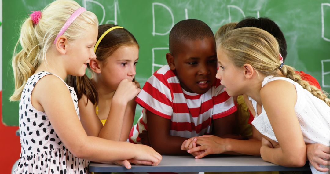 Diverse Group of Children Whispering in Classroom - Free Images, Stock Photos and Pictures on Pikwizard.com