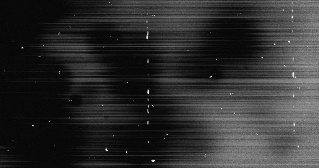 Abstract Black and White Motion Blur Background with White Specks