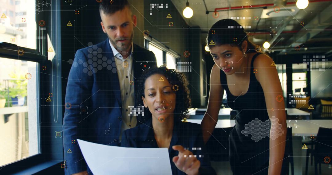 Professional Team Analyzing Data in Modern Office Setting