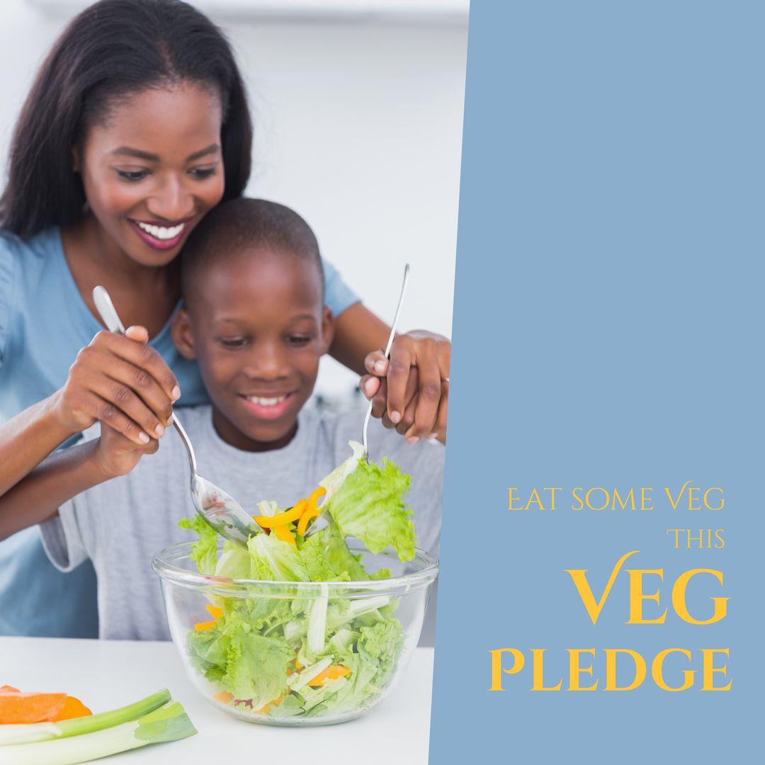 Happy African American Mother and Son Making Salad at Home for Veg Pledge - Download Free Stock Templates Pikwizard.com