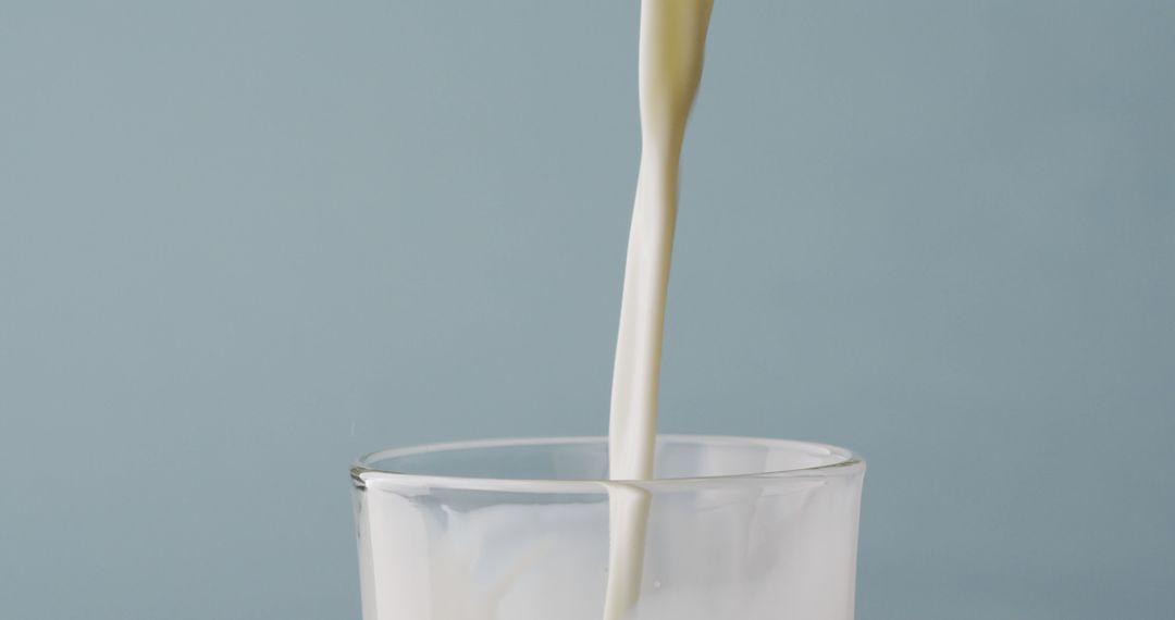 Image of glass of milk with copy space on blue background - Free Images, Stock Photos and Pictures on Pikwizard.com
