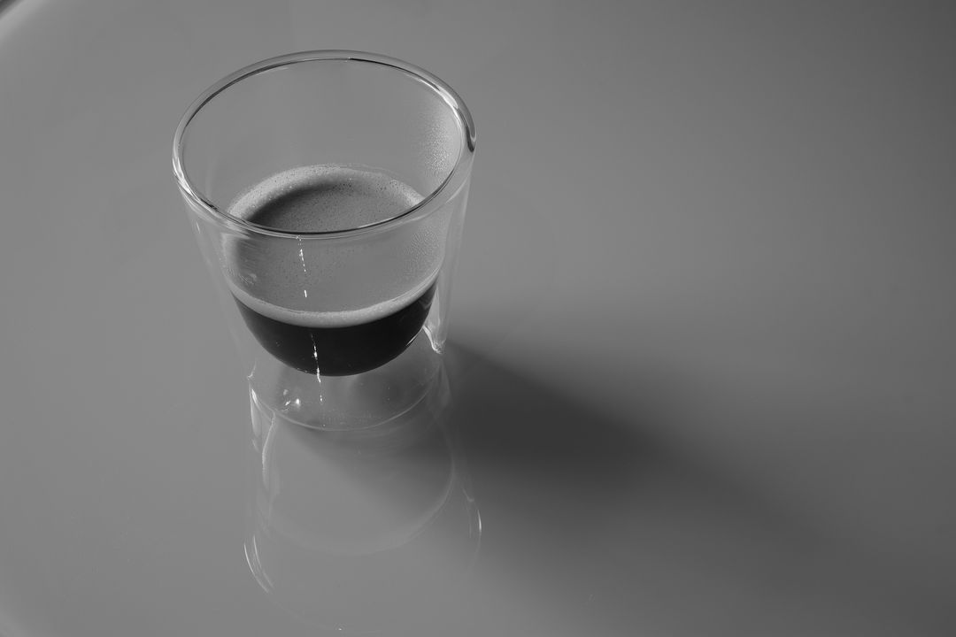Black and White Minimalist Espresso Cup on Table