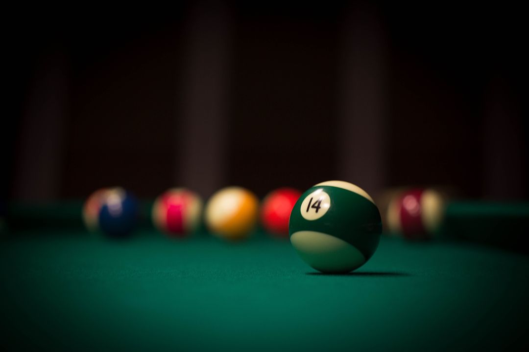 Close-Up of Number 14 Billiard Ball on Pool Table - Free Images, Stock Photos and Pictures on Pikwizard.com