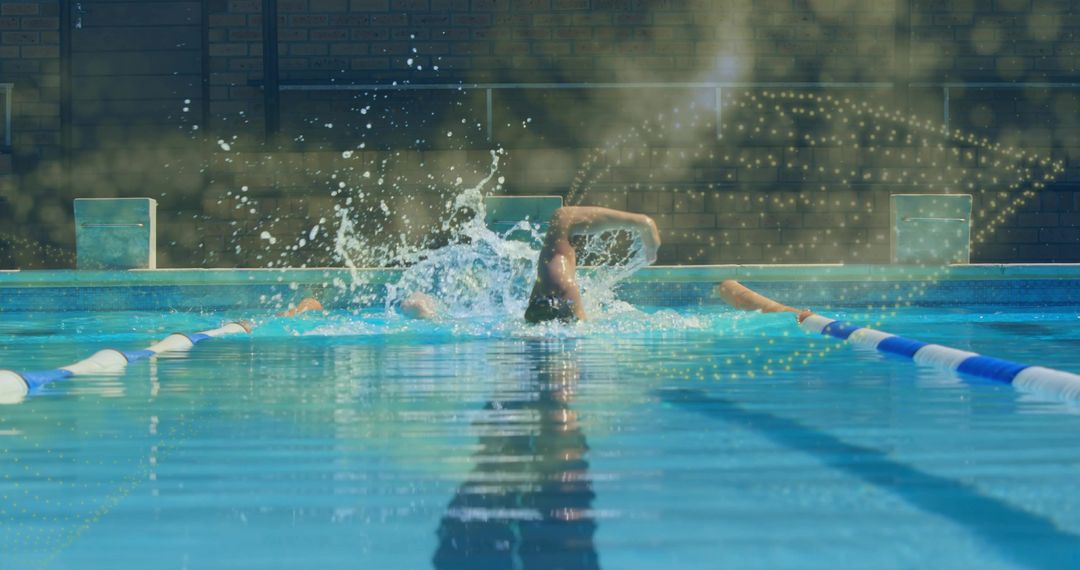 Man Engaging in Front Crawl Stroke in Sunlit Lap Pool