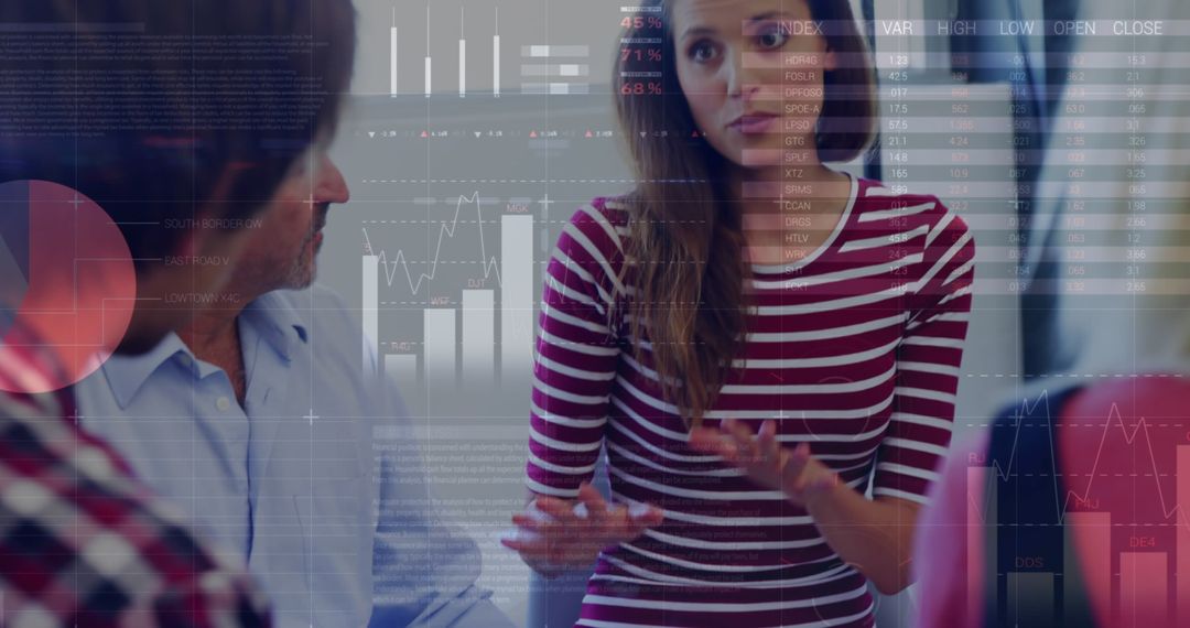 Business Team Discussing Financial Data with Digital Interface