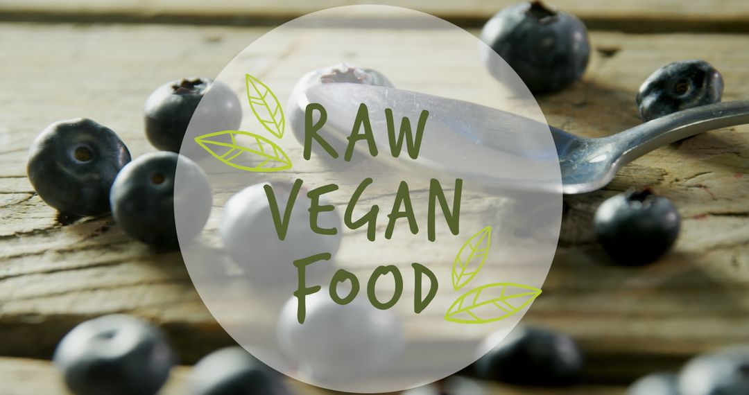Close-Up of Raw Blueberries and Spoon with Raw Vegan Food Text