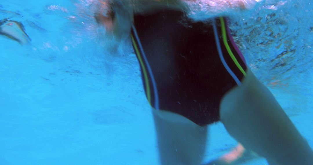 Underwater Shot of Swimmer in Action - Free Images, Stock Photos and Pictures on Pikwizard.com