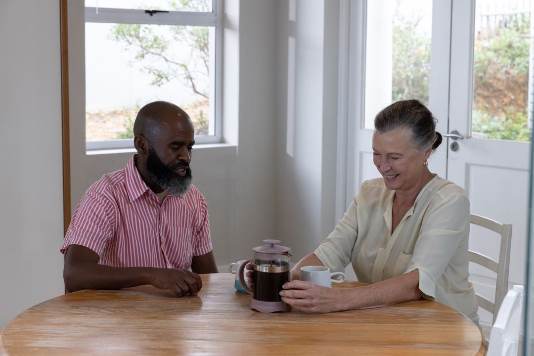 Diverse Couple Enjoying Coffee in Rustic Dining Space