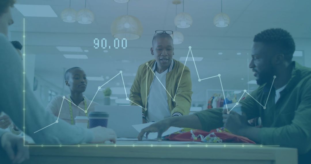 Diverse Professionals Analyzing Financial Data at Modern Office Table