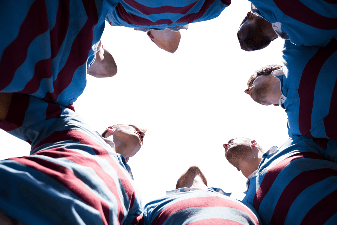 Transparent View of Rugby Players Huddling, Team Spirit Concept