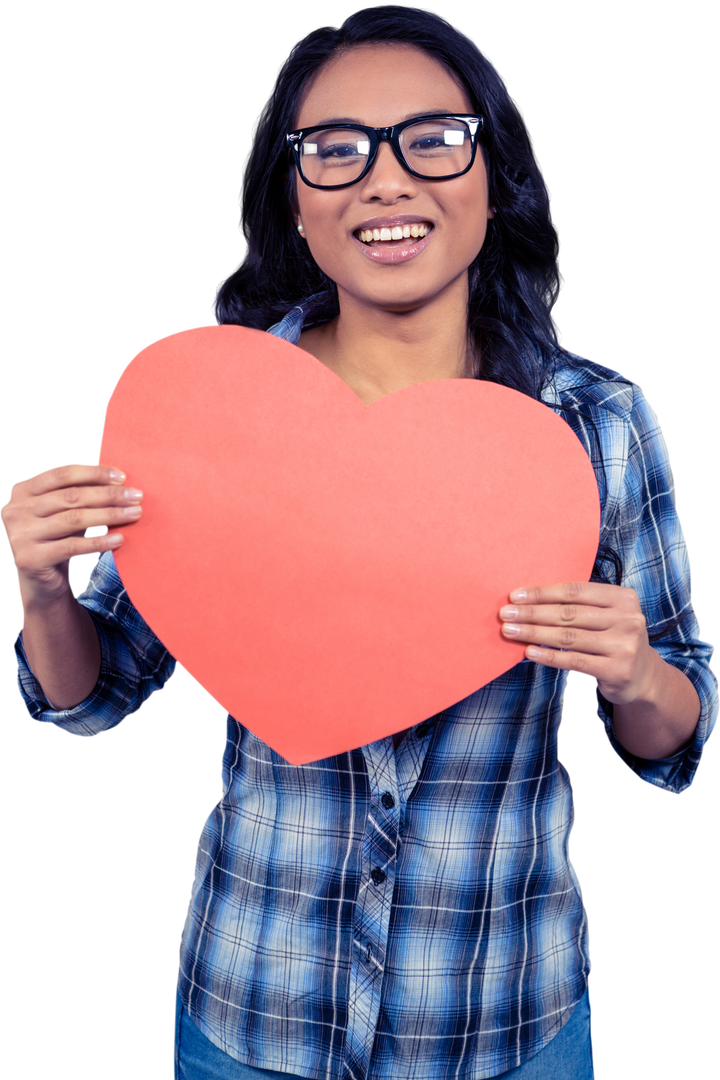 Smiling Asian woman holding red heart paper cutout showcasing love - Download Free Stock Images Pikwizard.com