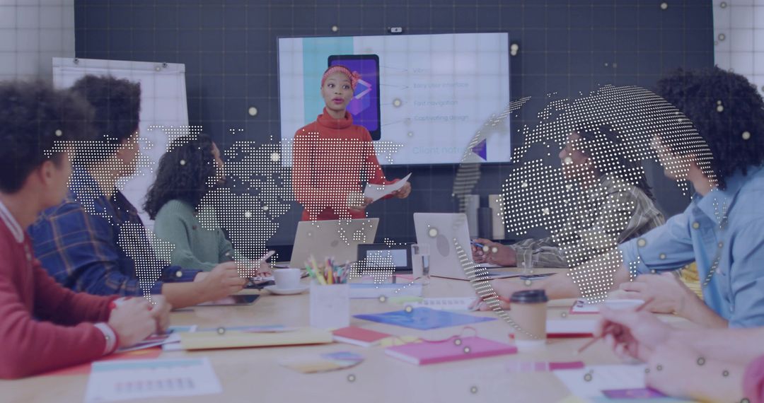 Female Leader Presenting Mobile App Prototype to Team During Boardroom Meeting
