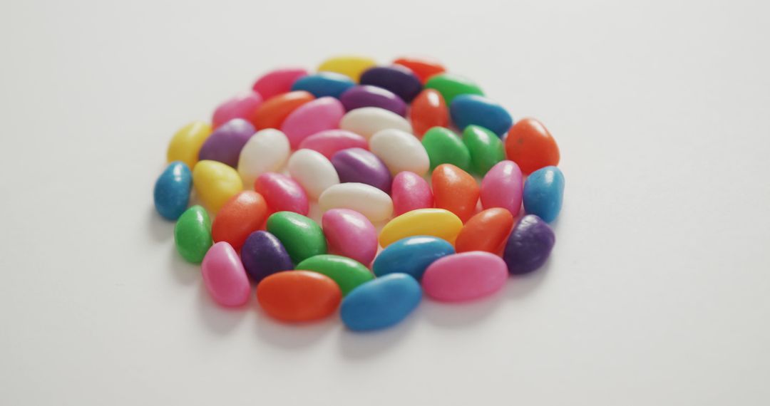 Vibrant Multicolored Jelly Beans on White Background - Free Images, Stock Photos and Pictures on Pikwizard.com