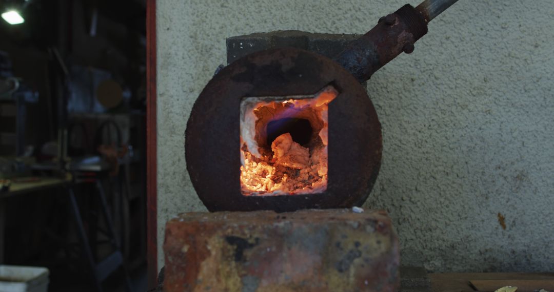 Small Industrial Furnace with Glowing Heat in Workshop - Free Images, Stock Photos and Pictures on Pikwizard.com