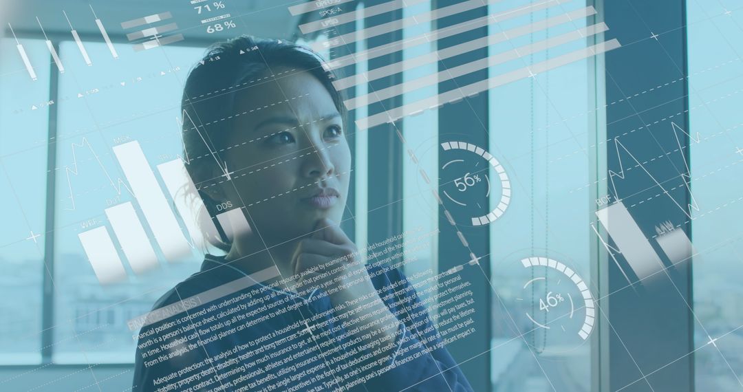 Asian Businesswoman Analyzing futuristic Data Graphics at Office