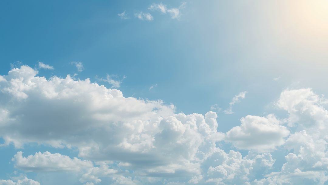 Serenity in the Sky with Puffy Cumulus Clouds and Gentle Sunlight