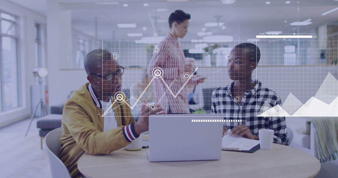 Modern Office Team Analyzing Business Data and Collaborating