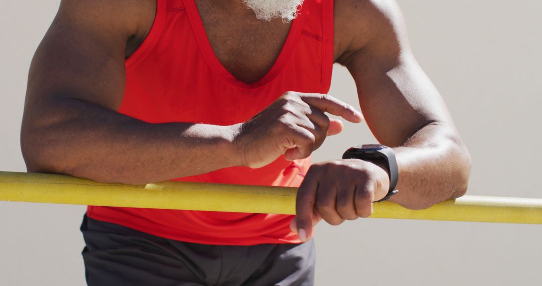 Senior African American Man Tracking Fitness Progress with Smartwatch - Free Images, Stock Photos and Pictures on Pikwizard.com