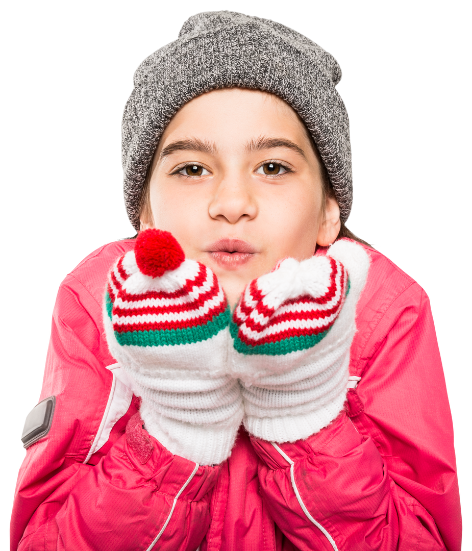 Child Wrapped in Winter Clothes Blowing on Transparent Mittens - Download Free Stock Images Pikwizard.com